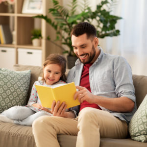 Dad and Child Reading Together
